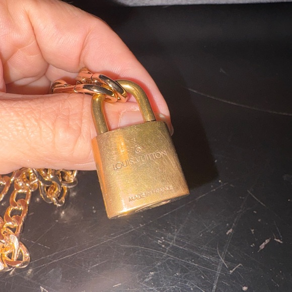 Authentic Louis Vuitton goldtone padlock no key .
Necklace not branded. #317 - Picture 4 of 5